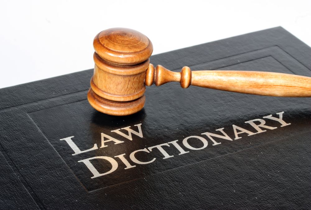 Gavel on top of Law Dictionary 